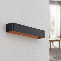 Arcchio LED-væglampe Karam, 53 cm, sort, metal, op/ned