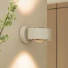 Arcchio LED-væglampe Rotari, linse, op/ned, hvid, metal