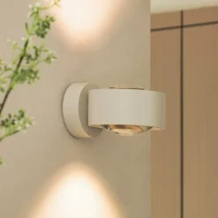 Arcchio LED-væglampe Rotari, linse, op/ned, hvid, metal