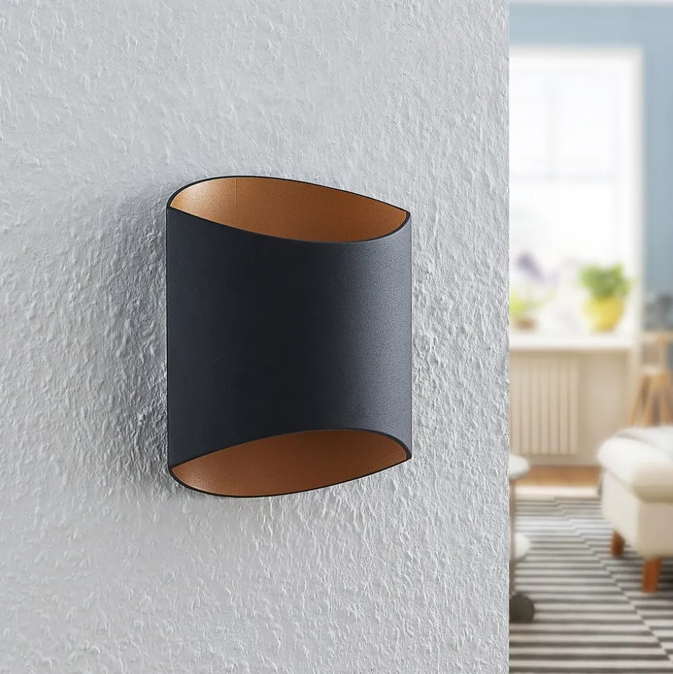 Arcchio Vilja væglampe, sort, guld, oval