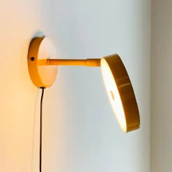 Dyberg Larsen LED-væglampe Starlight, gul, Ø 14 cm dæmpbar