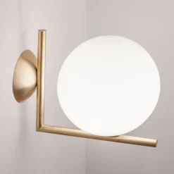 FLOS IC C/W1 væglampe, børstet messing