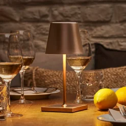 Genopladelig LED-bordlampe Nuindie mini, USB-C, bronze, IP54, dæmpbar.