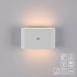 JUST LIGHT. LED-batteridrevet væglampe Ziddy, hvid, sensor 3.000 K