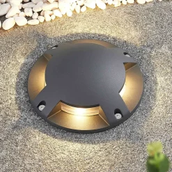 Lindby gulv-spotlight med LED Cormac, 4 lyskilder, Ø 21 cm, IP67