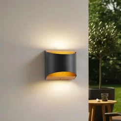 Lindby LED-væglampe Lenore, sort, metal, 13 cm, IP44