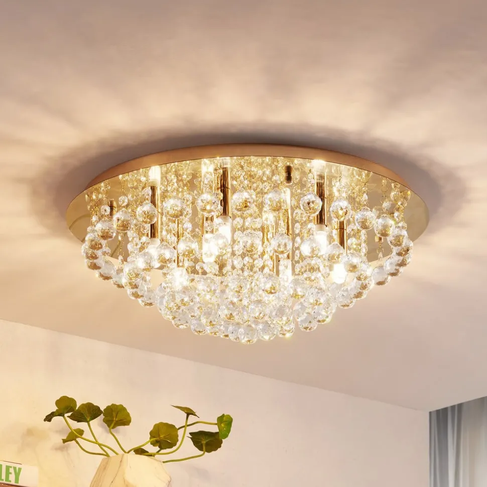 Lindby loftlampe Gillion, 8 lyskilder, guld, krystal, Ø 55cm