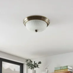 Lindby loftlampe Pakka, messingfarvet, glas, 31 cm, E27