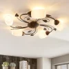Lindby loftlampe Stefania, 5 lyskilder, sort/guld, Ø58cm
