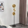 Lindby Senmia gulvlampe i guld, 3 lyskilder