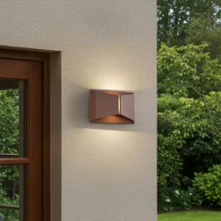 Lindby udendørs LED-væglampe Anlira, brun, op og ned, IP65