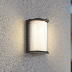Lindby udendørs LED-væglampe Calvik, sort, riflet, IP44