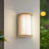 Lindby udendørs LED-væglampe Calvik, beige, riflet, IP44