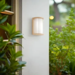 Lindby udendørs LED-væglampe Calvik, beige, riflet, IP44