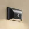 Lindby udendørs LED-væglampe Siana, sort, pc, sensor