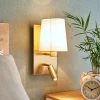 Lindby væglampe Aiden, 30 cm, antik messing, LED-læselampe