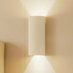 Lindby væglampe Colja, rund, højde 30,5 cm, gips, beige