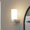 Lucande Basolo væglampe til badeværelset, sort, højde 17,2 cm, glas