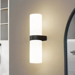 Lucande Basolo væglampe til badeværelset, sort, højde 31,5 cm, glas