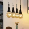 Lucande Gesja pendellampe, 4 lyskilder, lang, sort