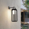 Lucande 2-i-1 LED-solcellelampe Tilena, sort, rund, aluminium