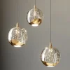 Lucande LED-pendellampe Hayley, Ø 25 cm, 3 lyskilder, guld, glas