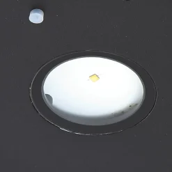 Lucande LED-solcelle-væglampe Tavon, rund, sort, sensor