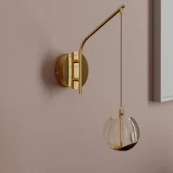 Lucande LED-væglampe Hayley, guldfarvet, glas, 34 cm høj