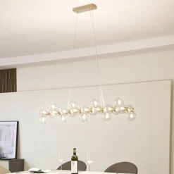 Lucande-pendel Naelen, guld/amber, 125 cm, glas, G9