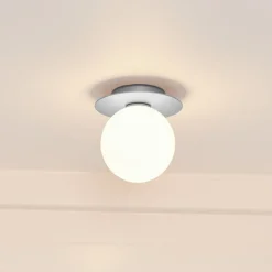 Nuura Liila 1 Medium væglampe IP44, sølv/hvid, varmhvid