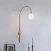 Væglampe Una, metal, glas, koralrød